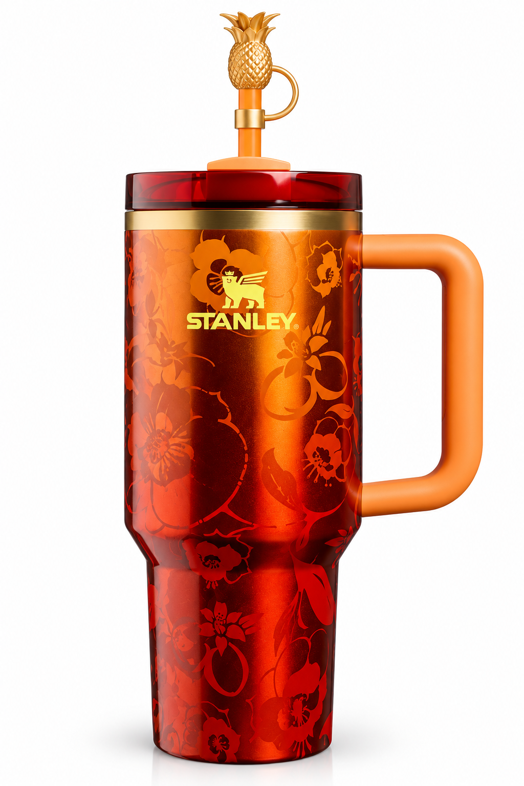 A Stanley tumbler with a red and orange floral pattern, a solid orange handle, and a gold lid featuring a pineapple pour spout, shown on a white background.